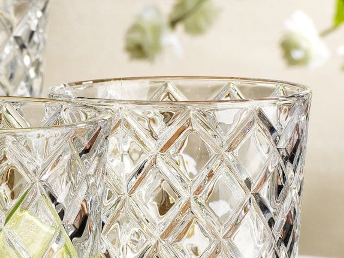 A stylish layout of Luxury Diamond Cut Highball Glasses, designed for a luxurious drink experience at home.