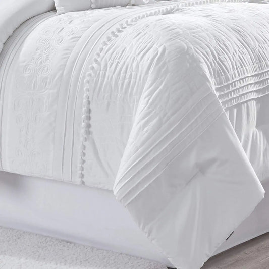 Stylish layout of the Chezmoi Collection Grace 7-Piece Queen Comforter Set with blush floral accents and textured pom-pom details, exemplifying the chic white floral comforter set.