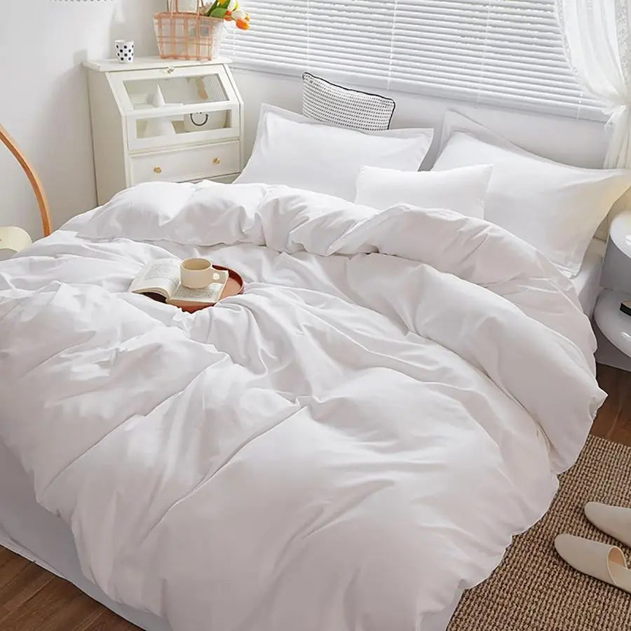 Full view of the Luxury Hotel Collection Ultra-Soft Lightweight Queen Comforter Set on a neatly made bed, highlighting its elegant appearance.