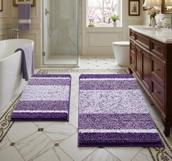 Charming display of the purple Chenille Bath Mats, 2-Piece set, showcasing layers of calming colors ideal for any bathroom.