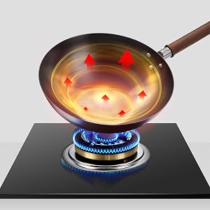 12-Inch Carbon Steel Wok on display with wooden utensils, adding style to your kitchen decor.