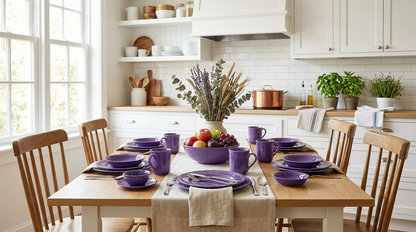 Charming arrangement of the French Countryside Antique Purple Stoneware Dinnerware Set with floral accents for a dining table.