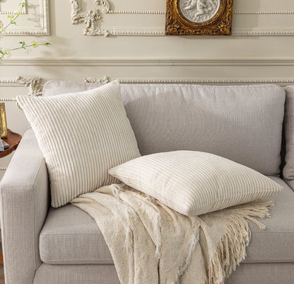 Decorated living room with Cream Corduroy Throw Pillow Covers 18x18, creating a warm and inviting atmosphere with stylish cushions.