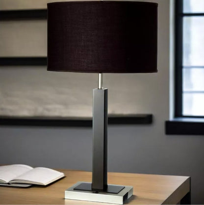 The 30” Modern Black Table Lamp in a stylish bedroom setting, demonstrating its use as a modern black lamp for elegant decor.