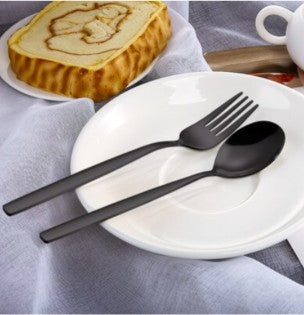 30-Piece Black Stainless Steel Flatware Set, Service for 6 paired with modern dinnerware and table linens