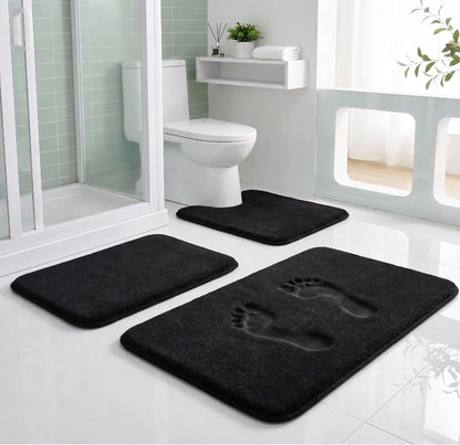 Black Memory Foam Bathroom Rug Set in a tidy bathroom corner, enhancing the decor with its sleek design.