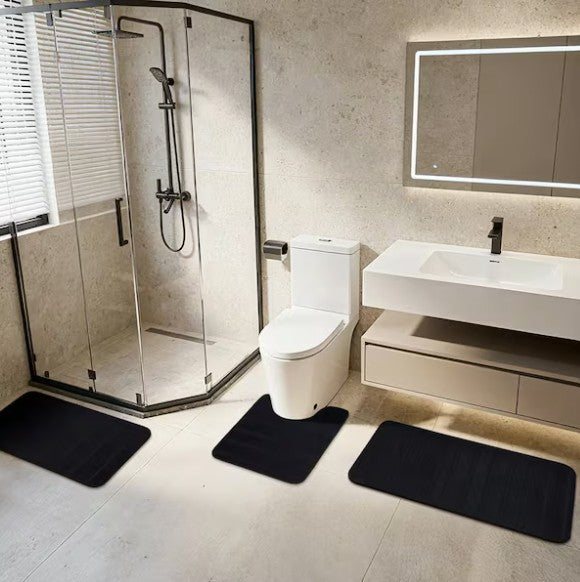Black Memory Foam Bathroom Rug Set with emphasis on its plush cushioning, perfect for bathroom comfort.