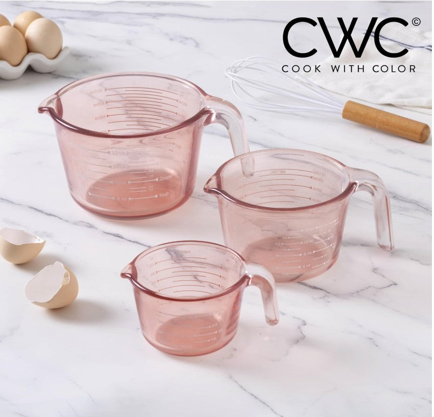 Pink glass measuring cups showing durable design and functionality for everyday kitchen use.