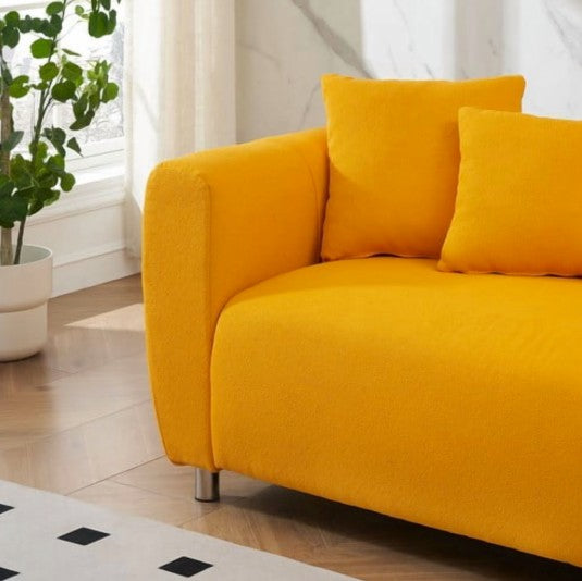 Close-up of the 89" Luxury Cotton Linen Sofa's curation with pillows and throws, enhancing comfort.