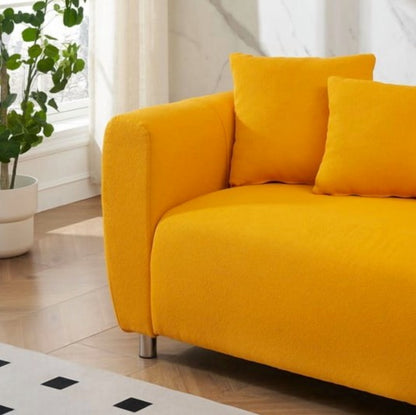 Close-up of the 89" Luxury Cotton Linen Sofa's curation with pillows and throws, enhancing comfort.