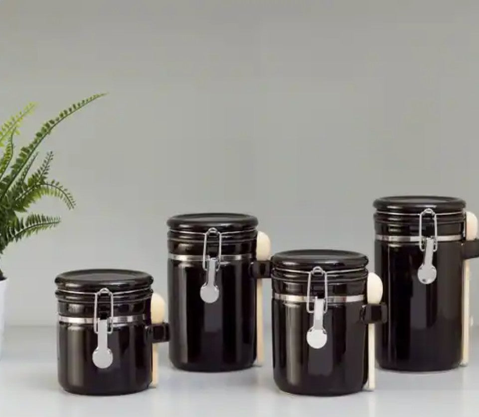 Elegant kitchen display of the Luxury Black Ceramic Canister Set with Airtight Seal & Wooden Spoons.