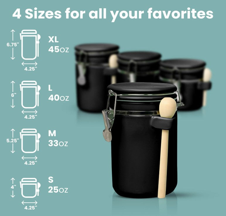 Luxury Black Ceramic Canister Set with Airtight Seal & Wooden Spoons in a contemporary kitchen setup.