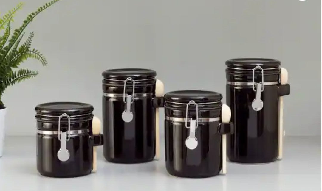 Luxury Black Ceramic Canister Set with Airtight Seal & Wooden Spoons enhancing kitchen aesthetics.