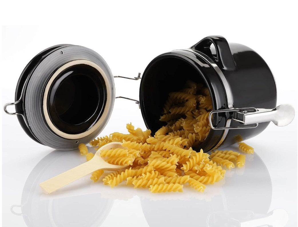 Detailed view of the airtight feature in the Luxury Black Ceramic Canister Set with Airtight Seal & Wooden Spoons.
