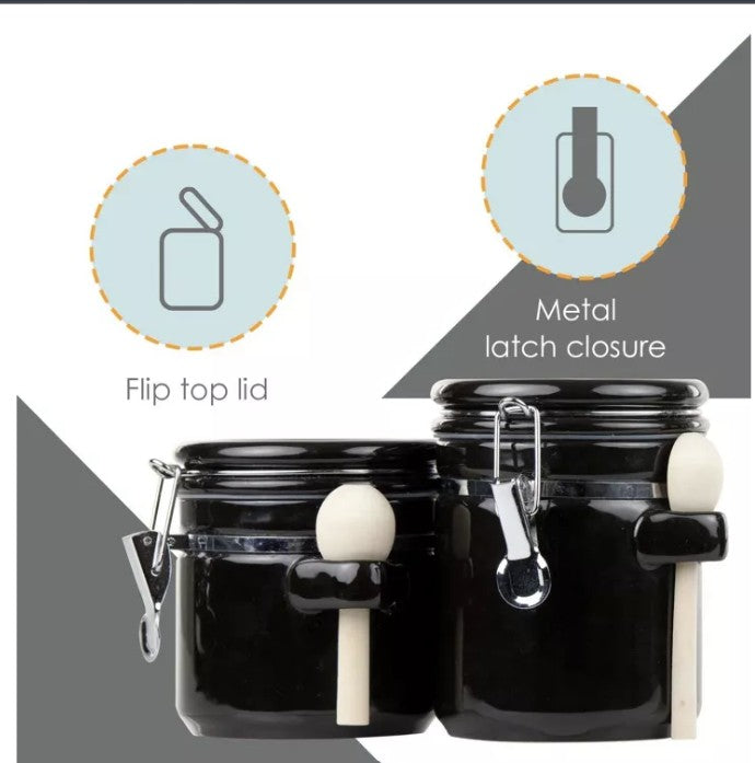 Luxury Black Ceramic Canister Set with Airtight Seal & Wooden Spoons styled with marble countertop.