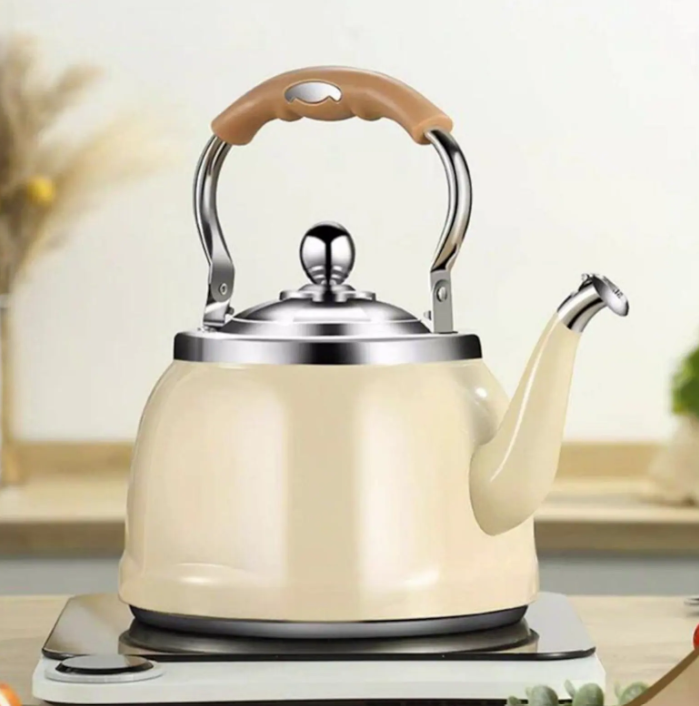 Elegant and vintage stainless steel tea kettle with a cool-touch handle, promoting safe pouring.