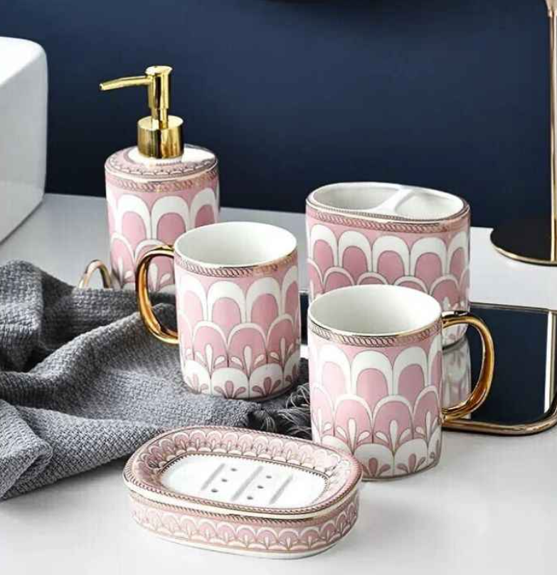 Full view of the Luxury Ceramic Hand Soap Dispenser set with additional bathroom accessories including a toothbrush holder and soap dish.