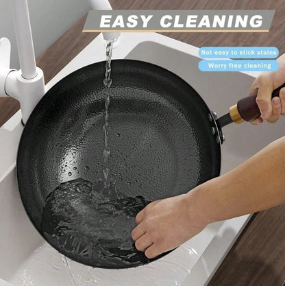 HomelyOasis Carbon Steel Wok being used for high-heat cooking, ideal for perfect sears and wok char.