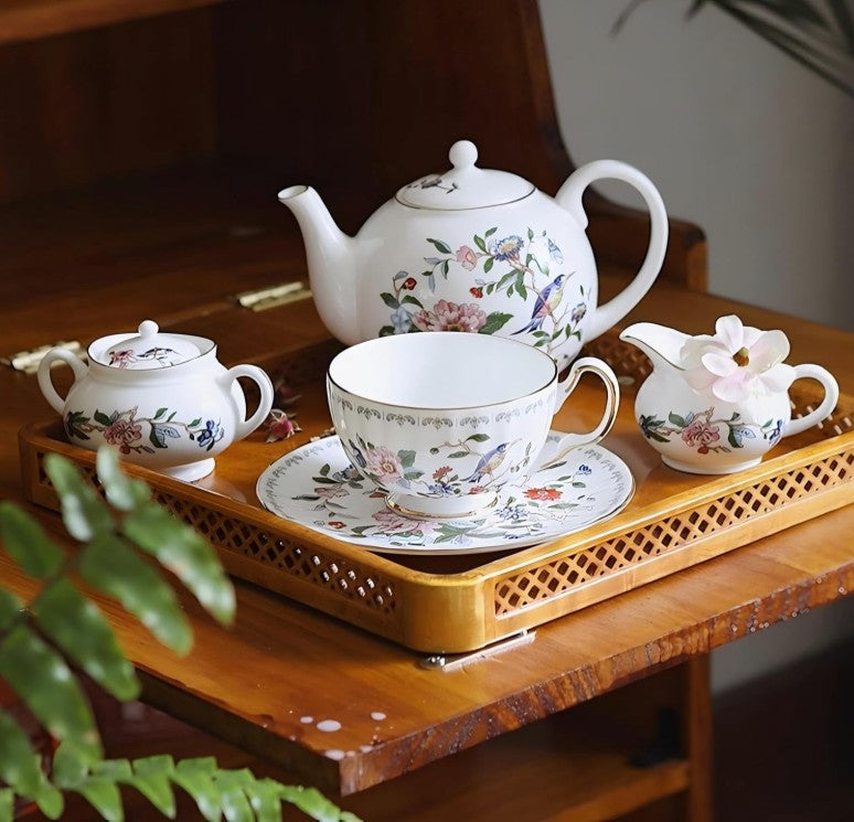 Close-up of the Aynsley 7-Piece Tea Set showcasing its fine bone china quality and floral artistry.
