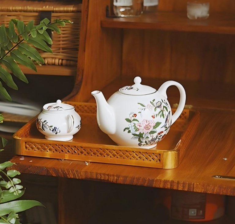 Aynsley Fine Bone China Tea Set elegantly displayed in a picturesque tea serving setting.