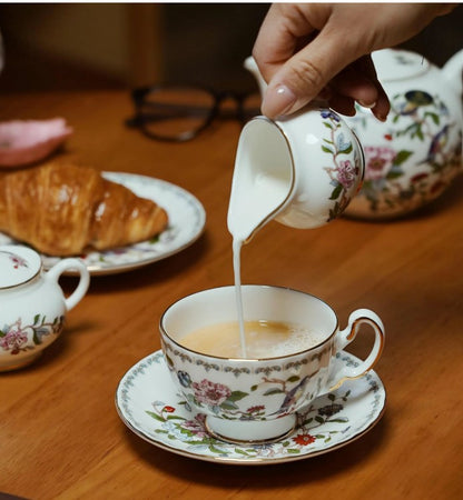 Aynsley 7-Piece Tea Set artfully arranged, emphasizing its vintage charm and collectible nature.