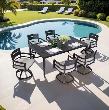 A modern outdoor setting featuring the black aluminum dining set ready for guests to enjoy.