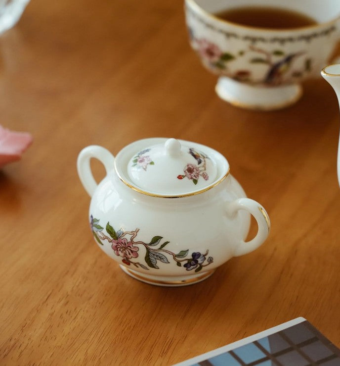 Aynsley 7-Piece Tea Set placed on a stylish table setup for an upscale tea experience.