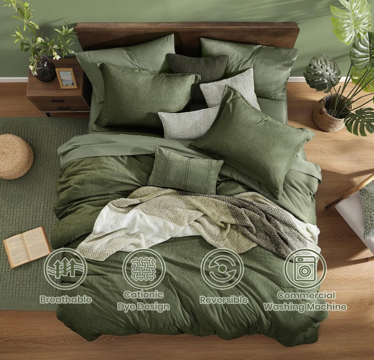 The olive green 7 piece bed in a bag set arranged with pillows and throws for a complete modern bedroom look.