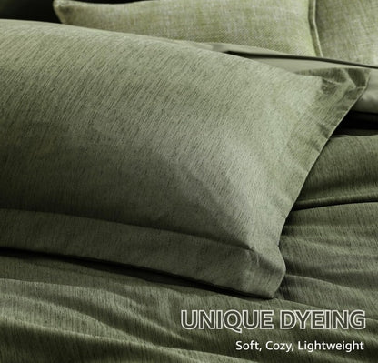 Elegant display of the olive green 7 piece bed in a bag set under soft lighting, enhancing its modern appeal.