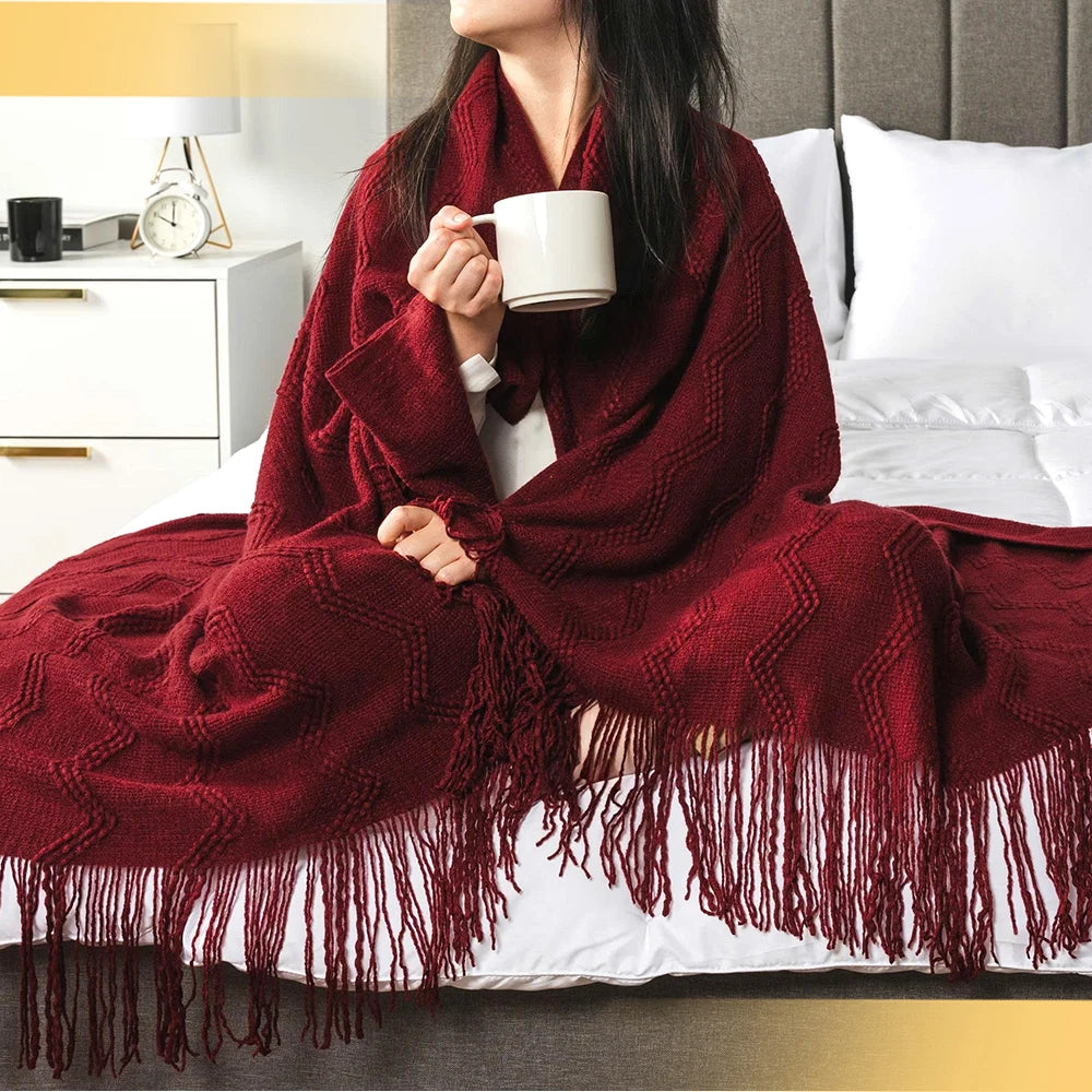 Lightweight burgundy throw blanket used in an outdoor picnic setting, illustrating versatility and style.