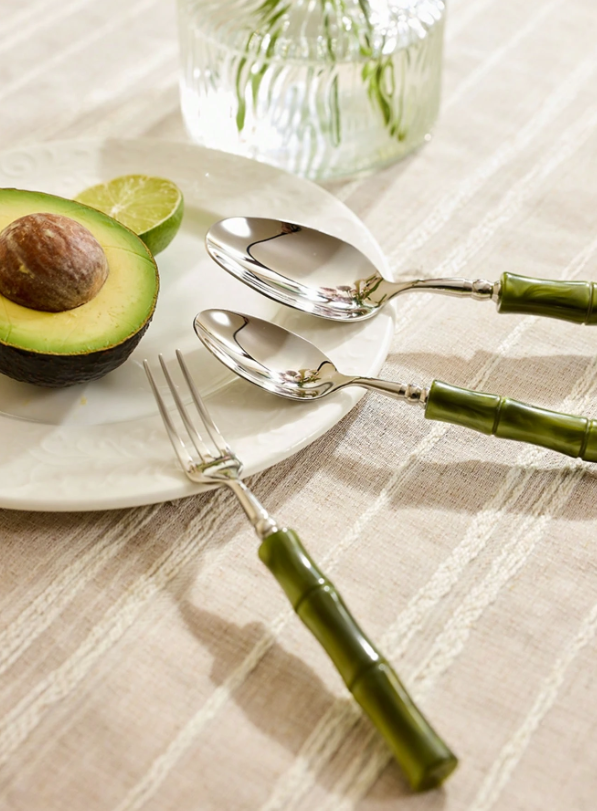 Elegant dining scene featuring the Flatware Set with 18/10 stainless steel cutlery and bamboo-style green handles, perfect for elevating any meal experience.