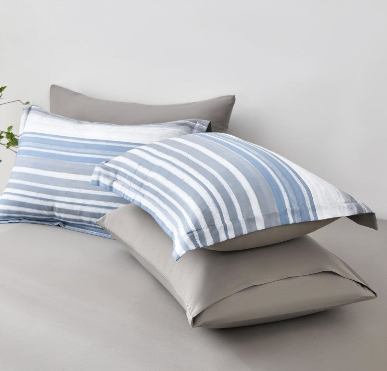 Light Blue Blue & White Striped Comforter Set in soft microfiber bedding, showcasing its modern coastal feel and low-maintenance features.