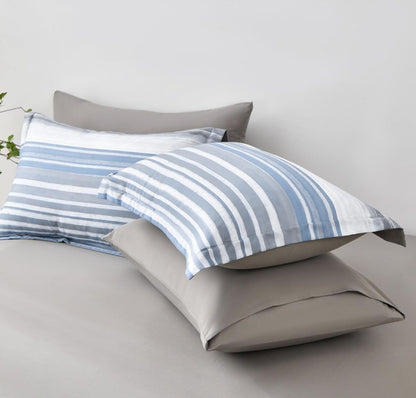 Light Blue Blue & White Striped Comforter Set in soft microfiber bedding, showcasing its modern coastal feel and low-maintenance features.