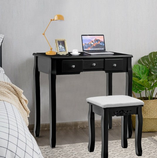 Black Vanity Table Set with a comfortable cushioned stool, perfect for a modern makeup vanity.