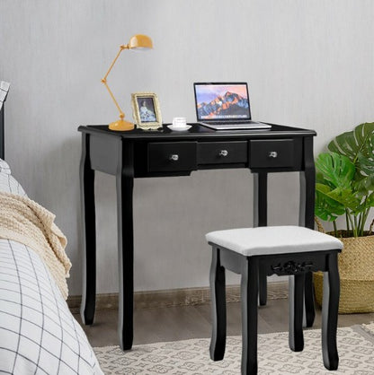 Black Vanity Table Set with a comfortable cushioned stool, perfect for a modern makeup vanity.