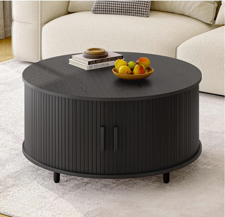 Overall look of the black round mid century coffee table in a modern setting – A stylish blend of decor and storage.
