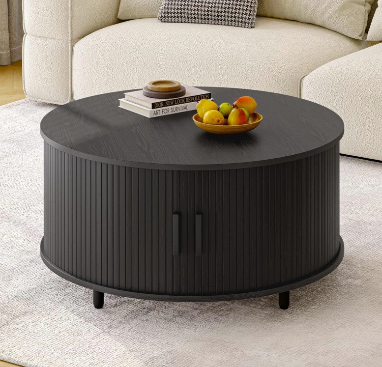 Stylish setup featuring the black round mid century coffee table – The centerpiece for a modern living room.