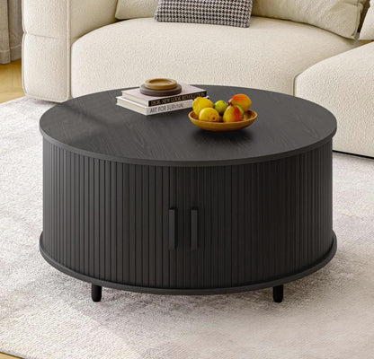 Stylish setup featuring the black round mid century coffee table – The centerpiece for a modern living room.