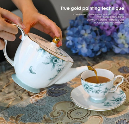 Vintage Bone China Tea Cup shining with golden accents against a simple background.
