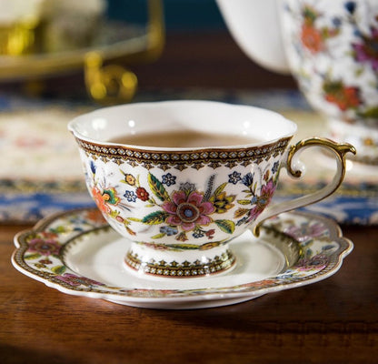 A set of Vintage Bone China Tea Cups with varying floral accents.