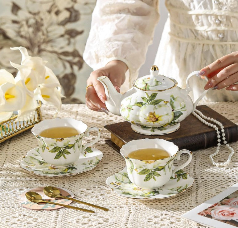 Vintage Blue Floral Bone China Tea Set arranged stylishly on a decorative table.