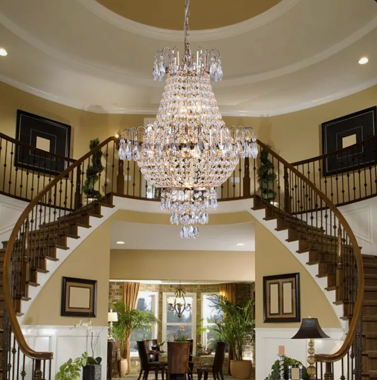 Gold K9 Crystal Chandelier casting enchanting reflections on walls, perfect for high ceiling spaces.