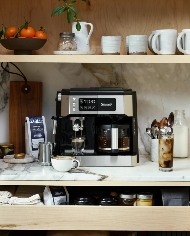 Lifestyle shot of the De'Longhi All-In-One Coffee Machine in use, capturing the essence of café-style drinks at home.