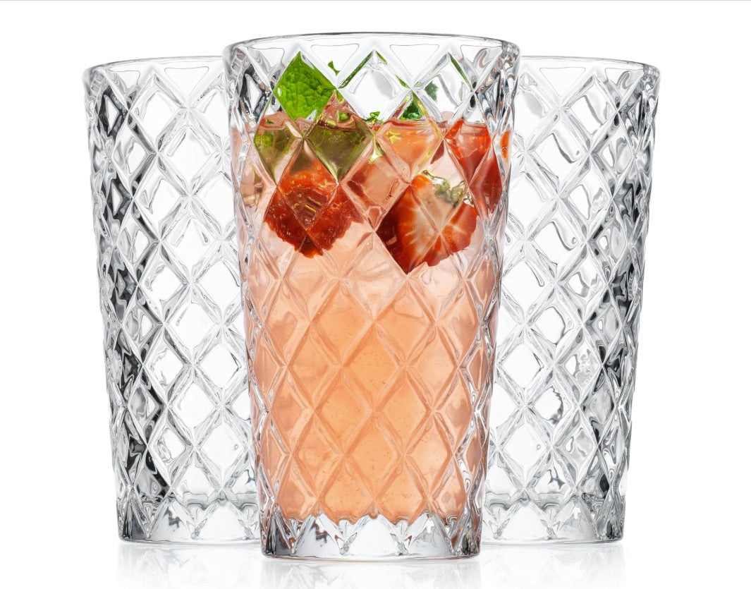 Beautifully arranged Luxury Diamond Cut Highball Glasses, perfect for enhancing your dining or entertaining experience.
