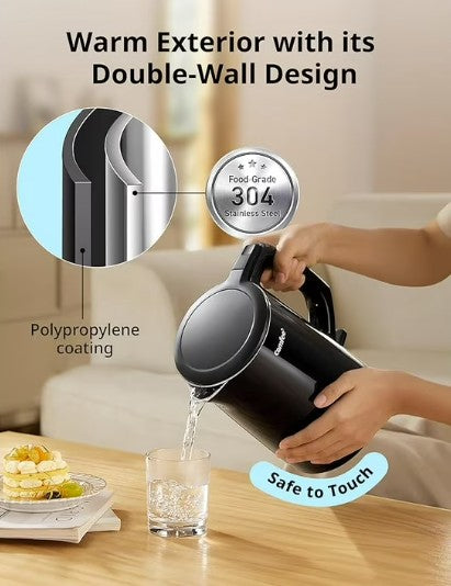 Comfee’ 1.7L Black Double Wall Electric Kettle on a stylish countertop, showcasing its elegant design for home kitchens.