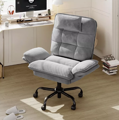 Side storage pocket on the Velvet Criss Cross Office Chair, a practical feature of this reclining desk chair for home office organization.