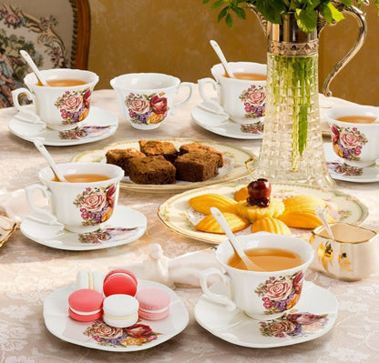 Charming presentation of vintage floral tea cups with spoons and saucers, ideal for afternoon tea occasions.