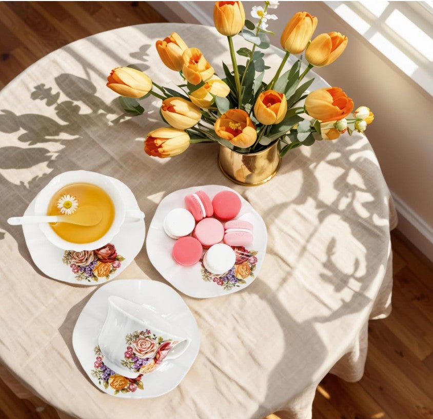 Close-up of vintage floral tea cups displaying intricate rose patterns, part of the Vintage Floral Tea Cup Set that's ideal for special occasions.