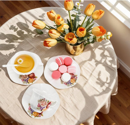 Close-up of vintage floral tea cups displaying intricate rose patterns, part of the Vintage Floral Tea Cup Set that's ideal for special occasions.