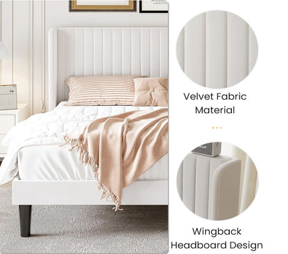 Thoughtful styling with Luxury Velvet Wingback Bed Frame, surrounded by elegant bedding and decor.